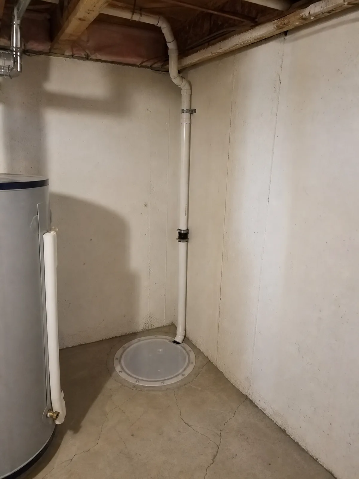 Sealed sump pit used as the suction point for a radon mitigation system
